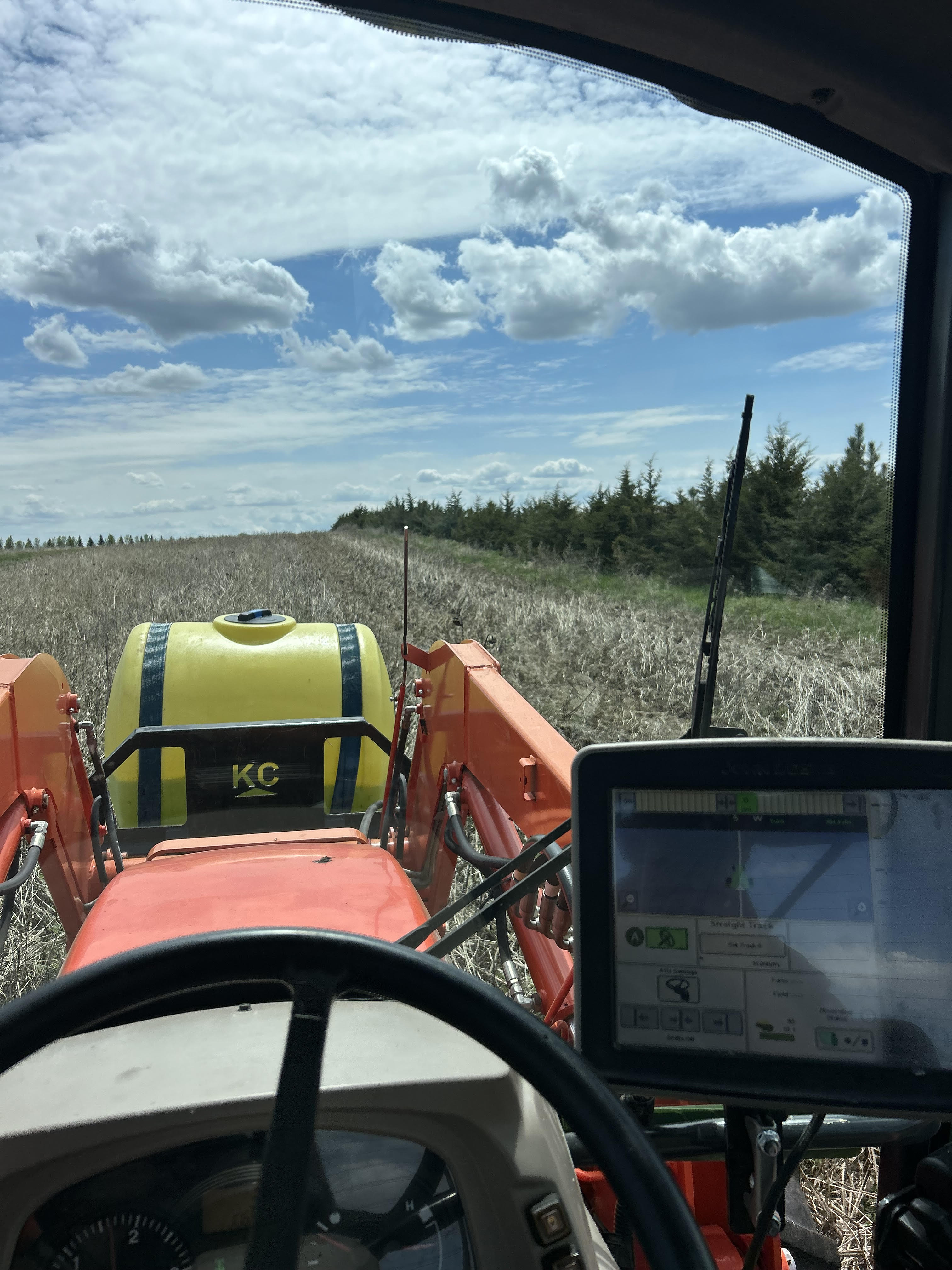 Koltan Ohnell - Owner of Knockout Land Management with equipment in the field